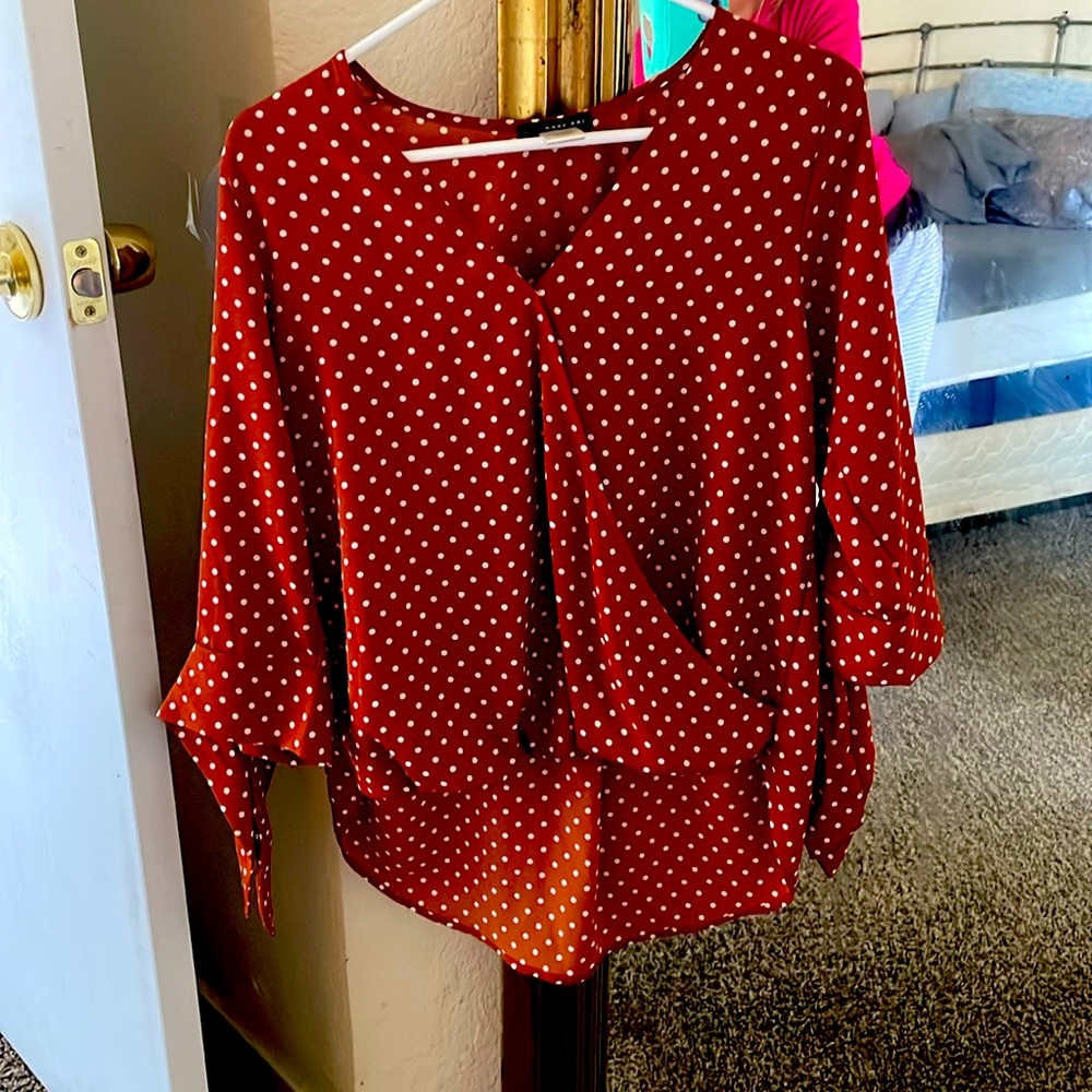 Small top super cute for a date night!  Very flowy and comfy.  I wore it once.
